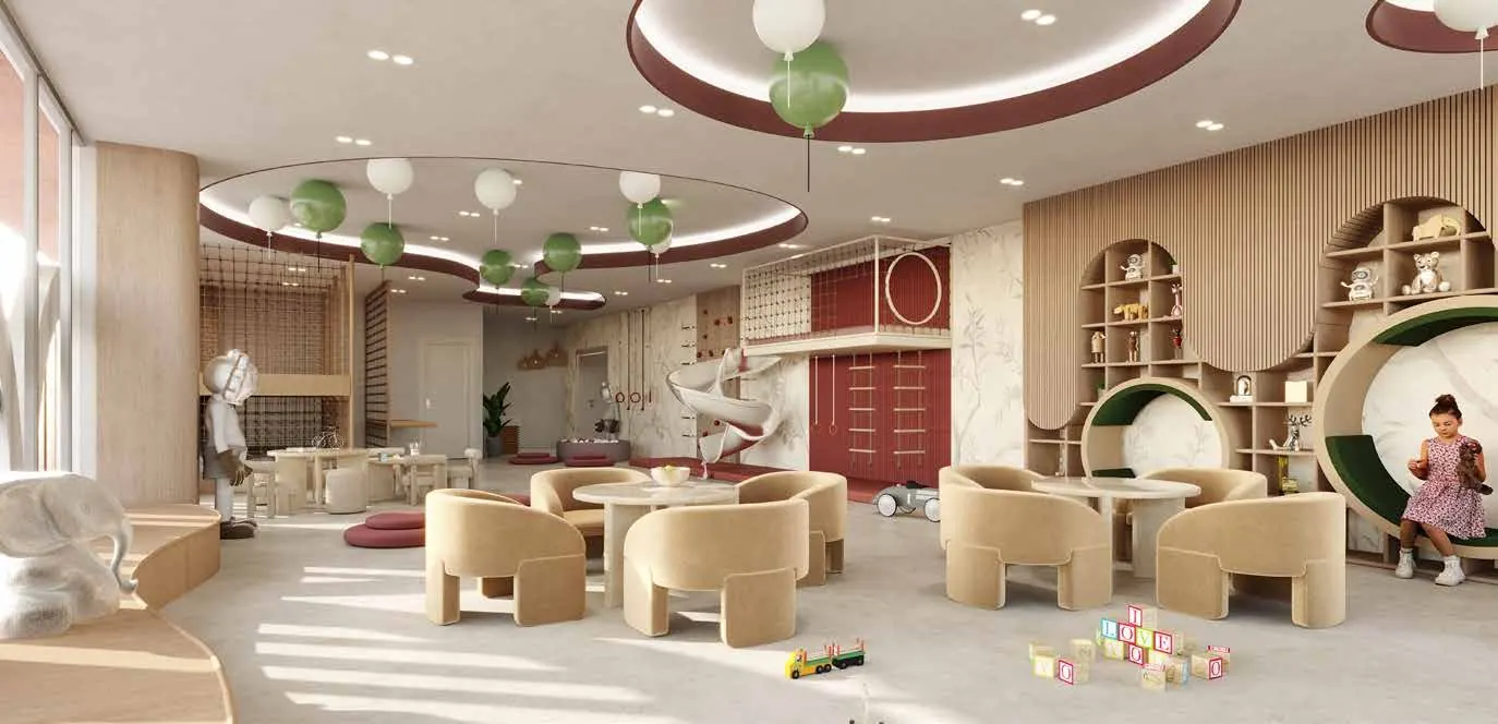 A colourful children’s indoor playroom with play equipment and activity areas.